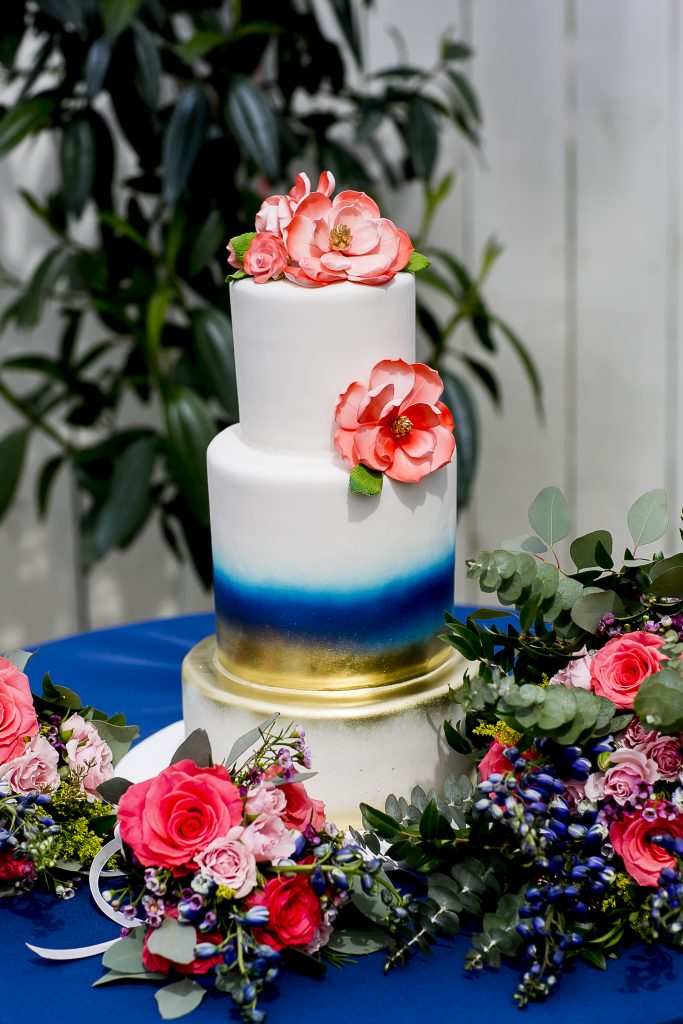 Venues often take care of more details than just the place. They will provide one stop shopping for cakes and flowers. 