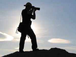 photographer at sunset