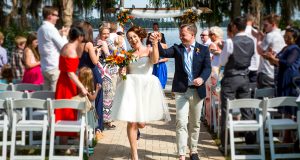 Capturing the Casual, Fun Exit of a Happy Couple.