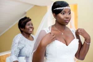 Art of the Moment: Bride prepares herself for the groom, breathless with anticipation. 