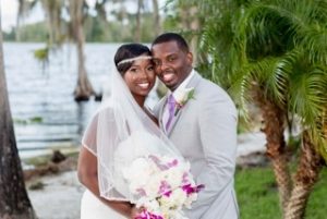 Wedding Couple enjoy a quiet moment of smiling joy. 